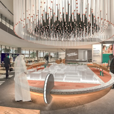 Our innovative concept for Sharjah's new neighbourhood, Aljada, designed by Zaha Hadid Architects, sales centre transcends the traditional focus on property transactions, evolving into a dynamic social hub that brings the community together. Design by Studio Königshausen.